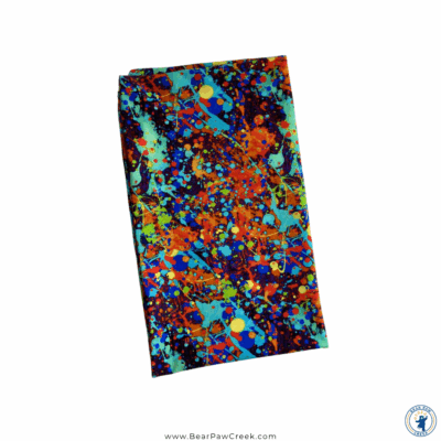 Image shows the sensory sack folded in a neat rectangle, showcasing the bright and colorful fabric.