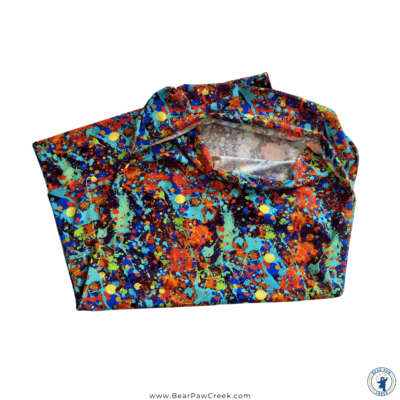 Images shows the sensory sack with it's bright colorful fabric folded with a white background.