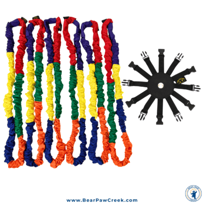 six connect-a-stretchy bands laying flat with a hub 12 next to them.