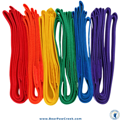 Tinikling Cords laid out next to each other in ascending rainbow colors.