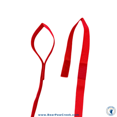 Showing a red Tinikling Cord with one loop open and one Velcro shut.
